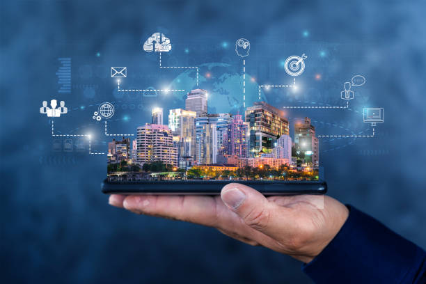 istock Cloud technology in smart city concept with human hand carries digital tablet with megapolis city skyscrapers. 2148089342