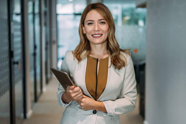 istock Confident businesswoman in modern office. 2148092447