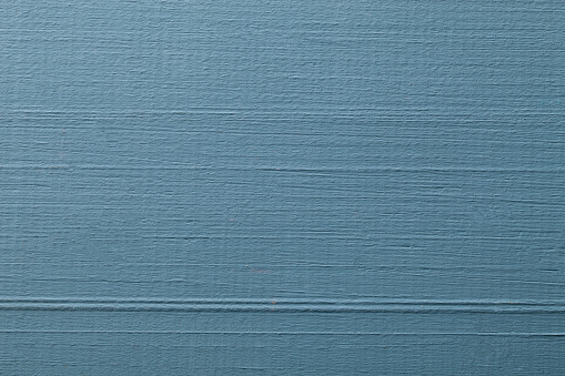Blue painted wood textured.