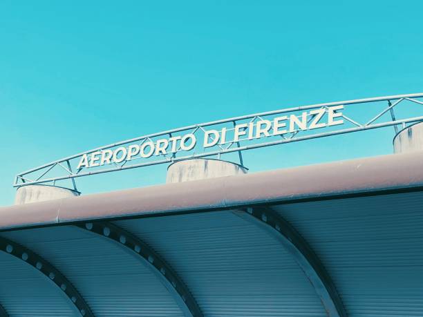 Florence, April 8th 2024, sign of Florence Airport. Aeroporto di Firenze-Peretola and formally Amerigo Vespucci Airport, is the international airport of Florence Florence, April 8th 2024, sign of Florence Airport. Aeroporto di Firenze-Peretola and formally Amerigo Vespucci Airport, is the international airport of Florence florence italy airport stock pictures, royalty-free photos & images