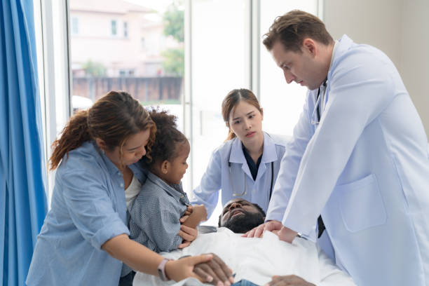 istock The doctor puts a splint on a patient with a leg. 2148099254