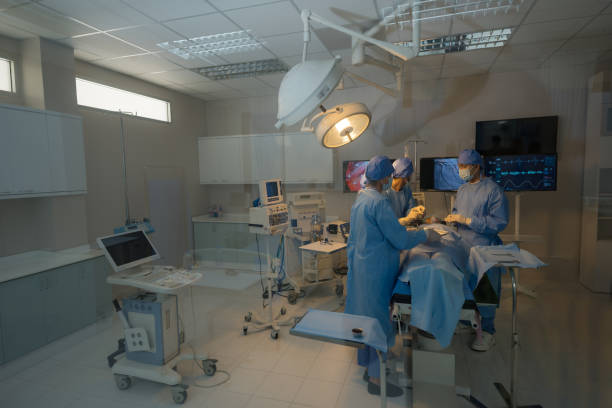 istock Doctor, nurse doing surgery on patient. 2148099287
