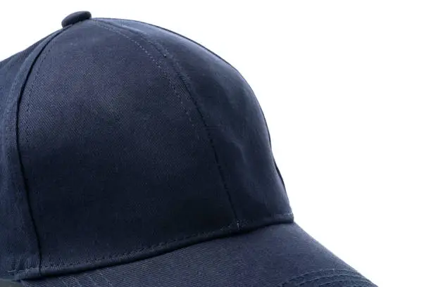 Photo of Navy Blue Baseball Cap on a White Background With Clear Lighting