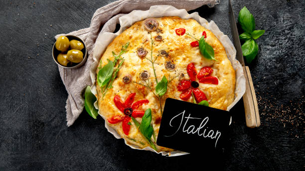 istock Focaccia art. Italian bread on dark background 2148100879
