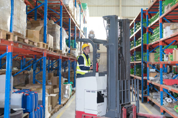 istock Male employee using a radio in the warehouse. 2148100906