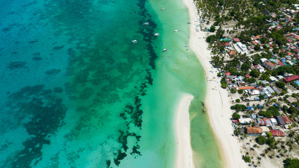 istock Tropical sandy beach and blue sea. Philippines 2148101034