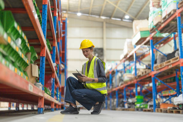 istock Female employees checking products. 2148101117