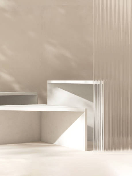 istock Three white minimal geometric shape podium, reeded fluted glass partition in dappled sunlight 2148101270