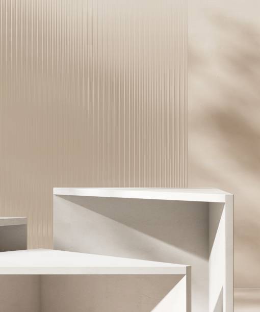 istock Two white minimal geometric shape podium, reeded fluted glass partition in dappled sunlight 2148101271