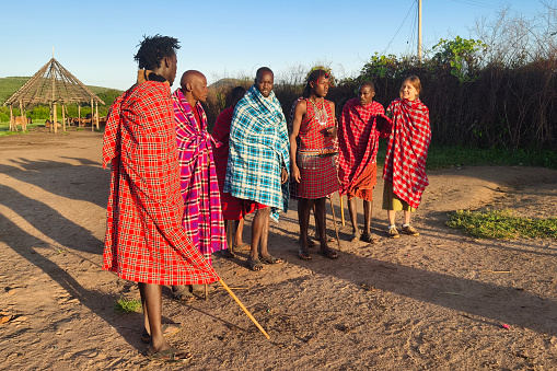 February 4, 2024. Masai Mara National Park. Kenya.: Group of unidentified African men from Masai tribe show a traditional Jump dance in a local village near Masai Mara National park, Kenya.