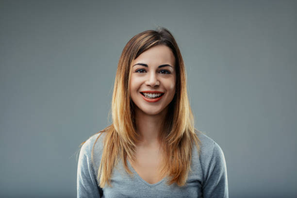 istock Grey top complements her bright, engaging smile 2148101907