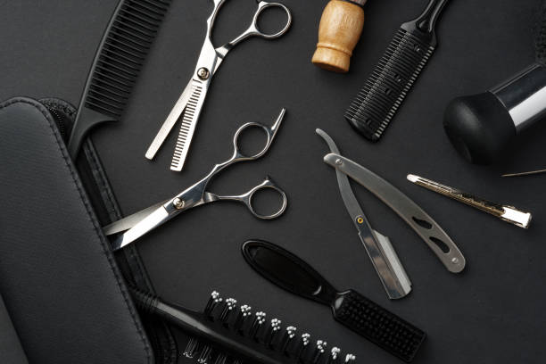 istock Variety of Hair Styling Tools and Accessories Displayed on a Dark Background 2148102507