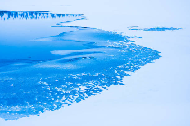 Ice and snow on frozen lake, Sweden.