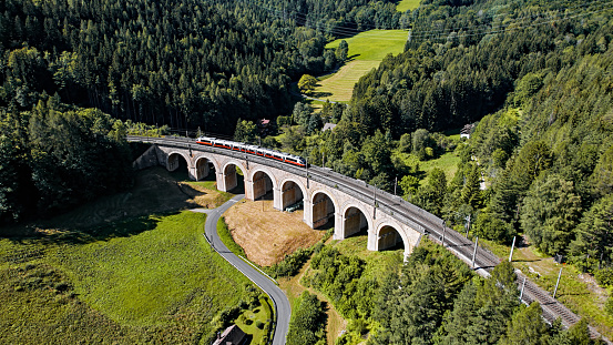 Aerial of train on viaduct in Semmering railway, Austria