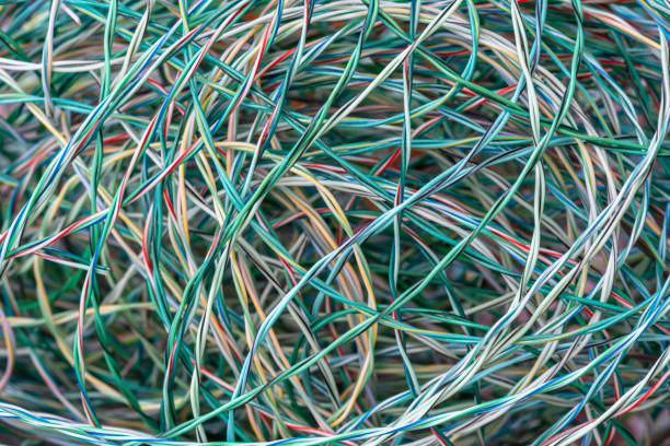 Tangled cable wire of IT and telecommunication network close-up