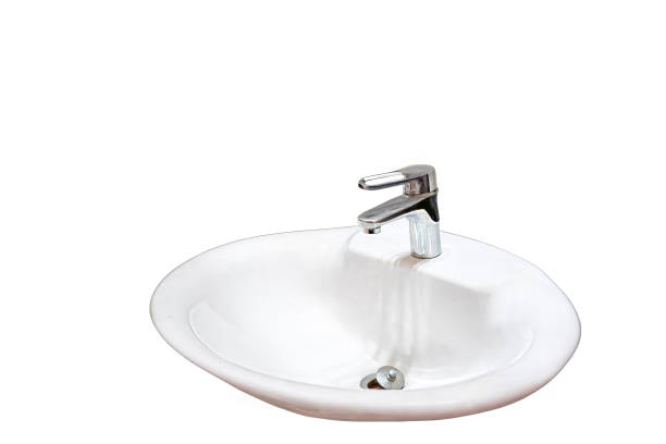 istock Isolated image of a white sink for washing hands on a white background. 2148107095