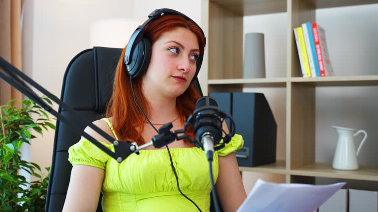 Portrait of Attractive Young Female Radio Host Hosting a Live Show