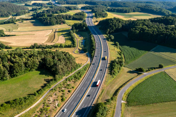 istock Highway in a rural landscape, aerial view 2148109734