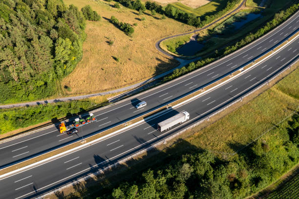 istock Traffic on rural highway, aerial view 2148109919