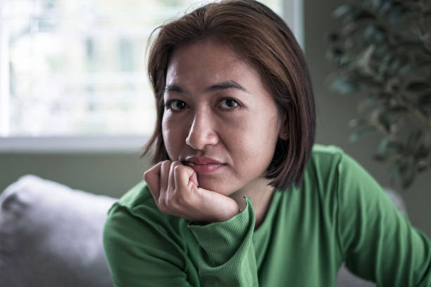 istock Close-up face woman sitting and smiling 2148110944