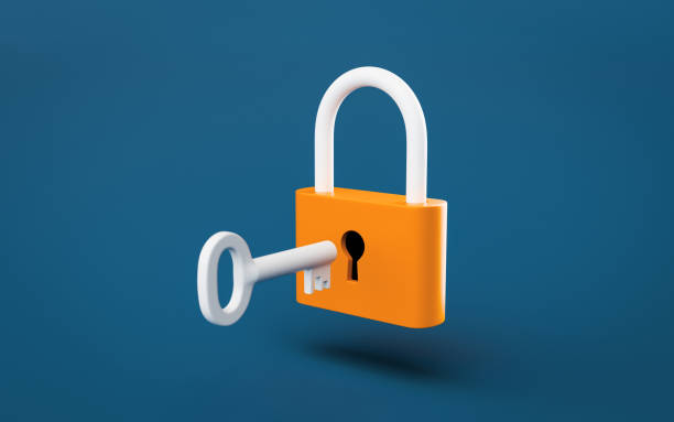 istock Padlock with a key in the keyhole on dark blue background 2148112804