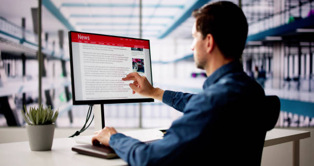 istock Man Reading News Website 2148115172