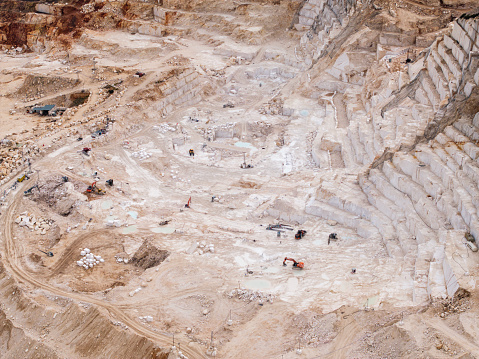 Aerial view of marble quarry with machinery and quarry equipment. Burdur, Turkey. Taken via drone.