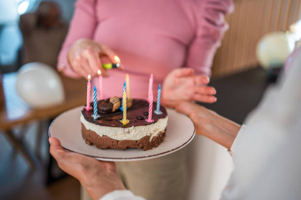 istock Birthday Celebration with Chocolate Cake in Multigenerational Family Setting 2148117630