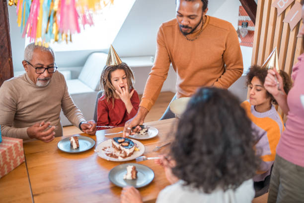 istock Diverse Family Celebrating a Birthday at Home 2148117647