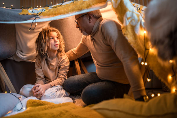 istock Diverse Grandfather and Grandson Enjoying Time Together Inside Fort 2148117706