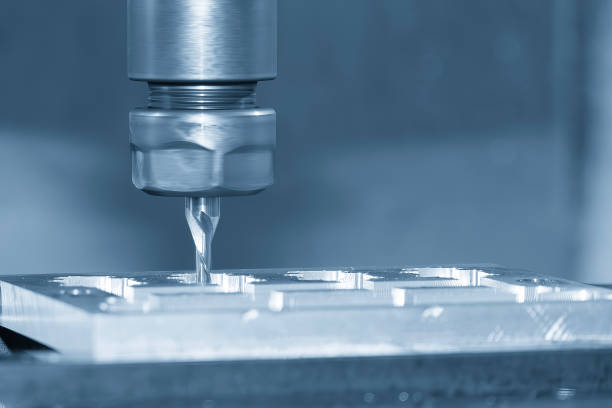 istock The CNC milling machine cutting  aluminum part by solid flat end mill tool. 2148119758