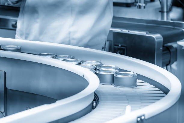 istock The high technology material handling process in canned food production by roller conveyor. 2148119775