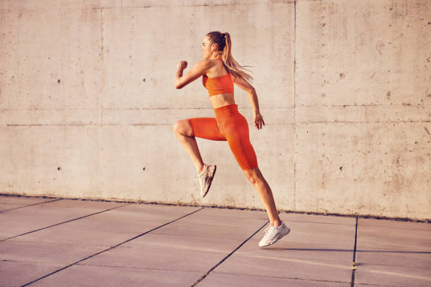 istock Fit woman run in urban environment 2148120302
