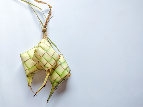 Ketupat is rice casing made from young coconut leaves. A local delicacy during Eid al-Fitr.
