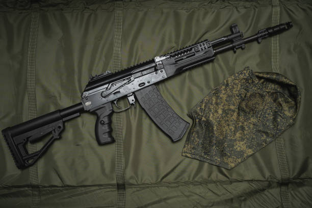 istock Military firearms, modern Russian assault rifle ak 12 and balaclava. 2148121919