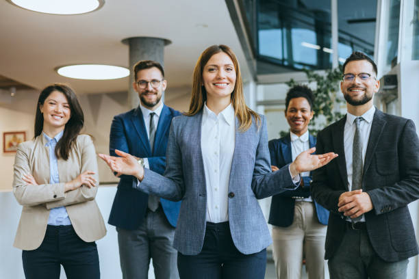 istock Confident business team standing in office 2148122362