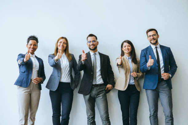istock Business professionals giving thumbs up 2148122379