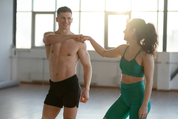 istock Sports latin athletes training together, young team training indoors 2148124973