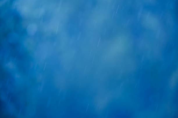 istock Abstract blue background with raindrops and bokeh 2148129413