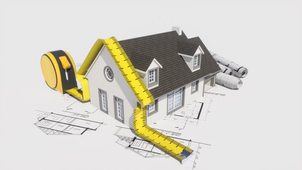 istock House model on top of architecture blueprints 2148130002