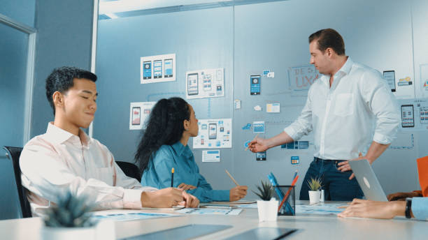 istock Group of business people discuss about using Ux and Ui design. Manipulator. 2148130866