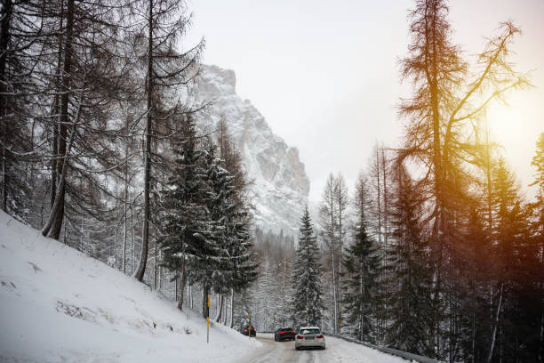 istock Winter road among forest in Dolomite mountains, Italy 2148131566