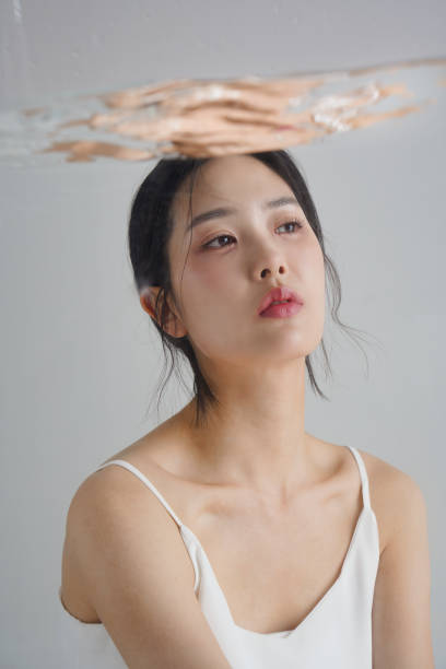 istock Young Korean Women's Moisturizing Skincare Image 2148131624