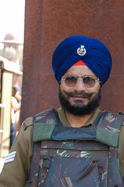 Uttar Pradesh, India - March 07, 2006: Portrait of a soldier guarding the surroundings of the Taj Mahal in the city of Agra