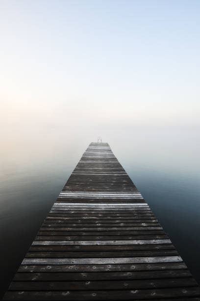 istock Wooden jetty in mist 2148132793