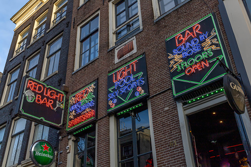 Amsterdam, the Netherlands. 16 March 2024. Neon signs at The Red Light Bar at \