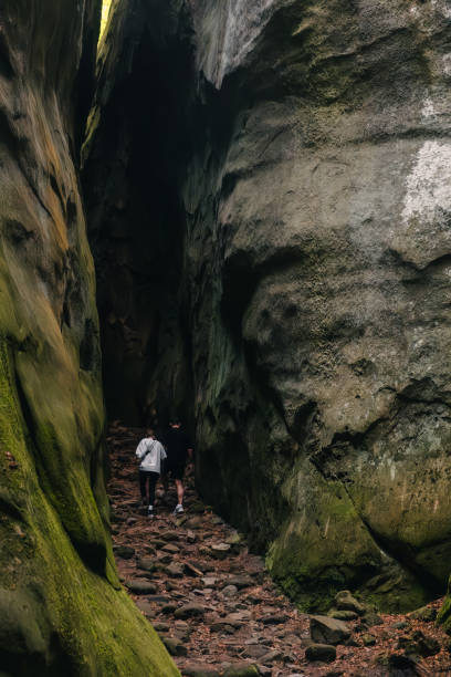 istock couple tourists walking by canyon 2148135115