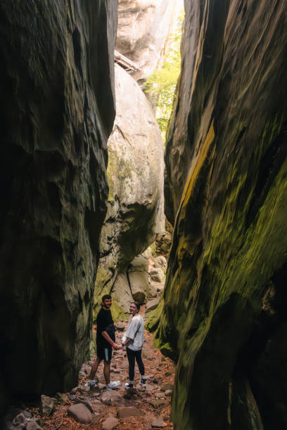 istock couple tourists walking by canyon 2148135124