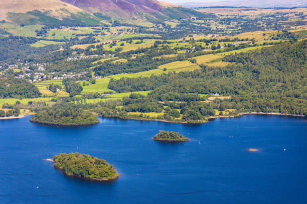 istock A large lake with small islands and boats, surrounded by mountains. (Lake District, Cumbria) 2148135457