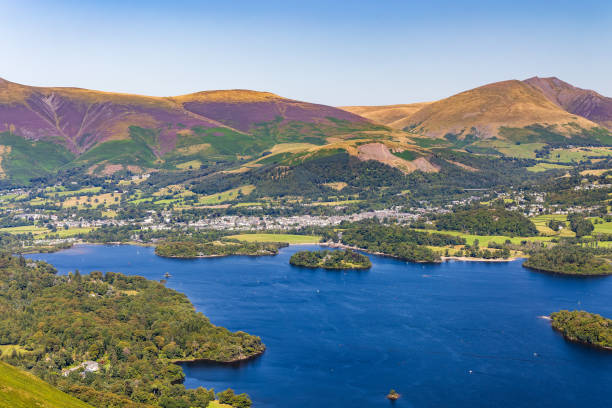 istock A large lake with small islands and boats, surrounded by mountains. (Lake District, Cumbria) 2148135542